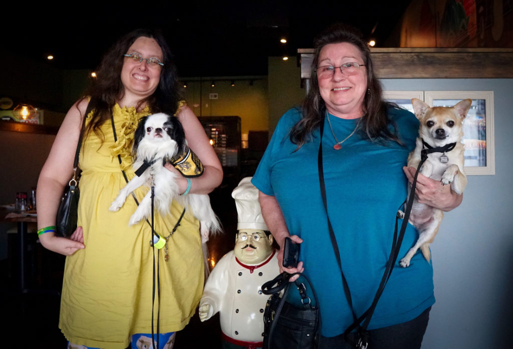 Veronica with Hestia and Tami with Chili at the Indian restaurant.