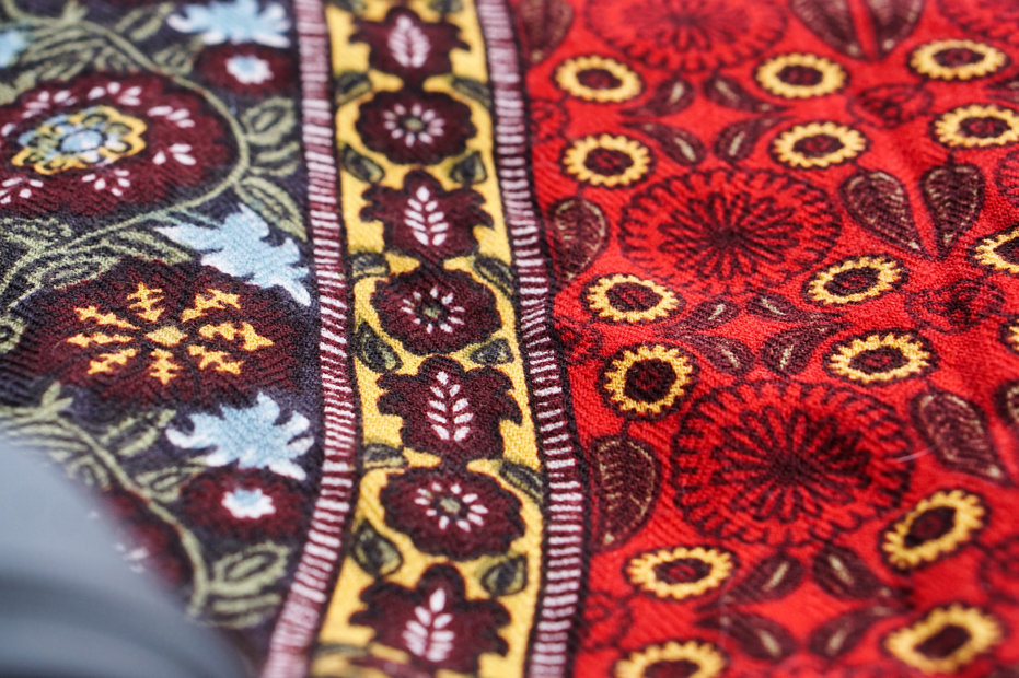 The mostly red with vaguely Indian patterned blanket of Brad's.
